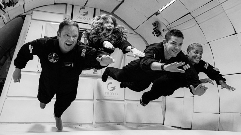 The crew of SpaceX's first privately funded trip to space is seen training for their journey.