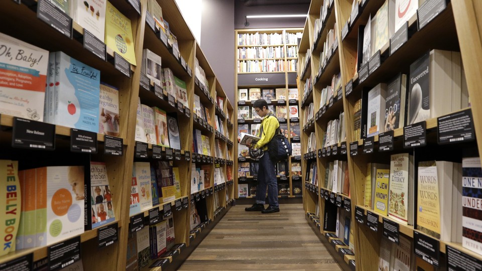 A customer browses at a book store in Seattle