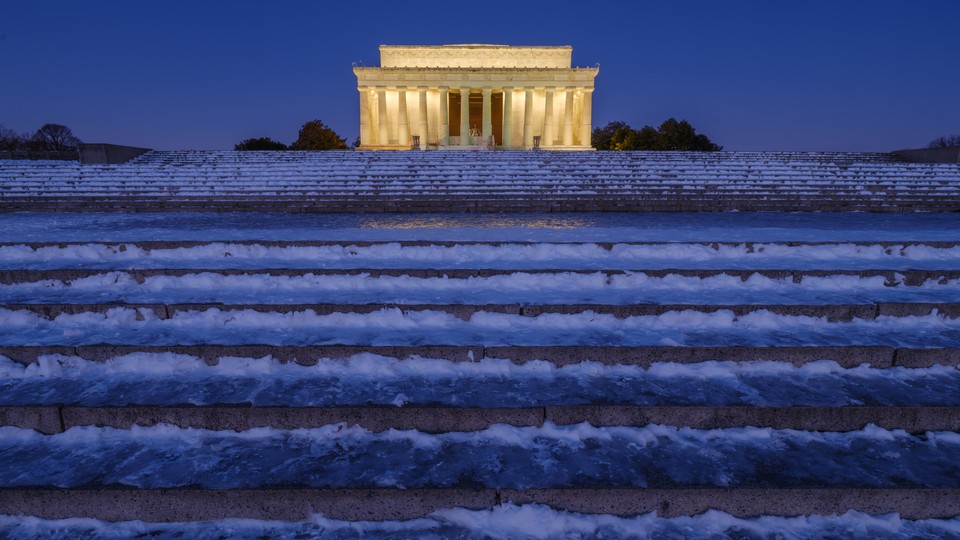 Ice and snow cover the steps to the Lincoln Memorial