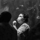 visitors in face masks at the Aquarium of the Pacific in July 2021