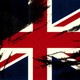 A British Union Jack flag smeared with black paint