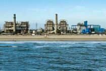 A desalination plant along the beach, in California