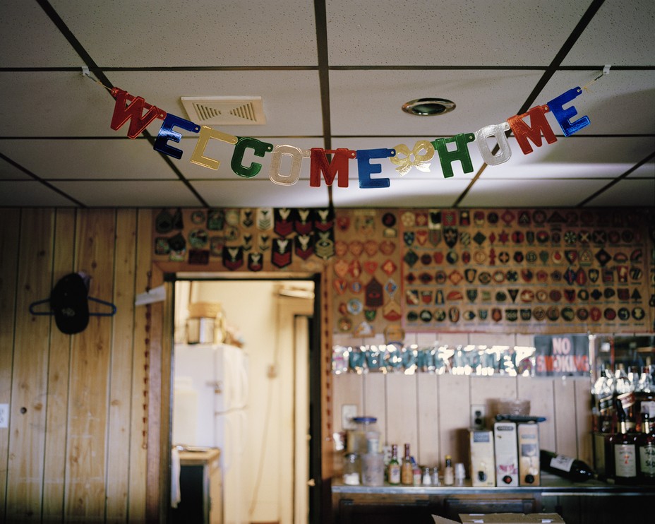 welcome home banner at the bar of a VFW club