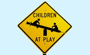 An illustration of a "Children at Play" sign