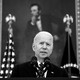 Joe Biden speaking at the White House with a portrait of Abraham Lincoln behind him