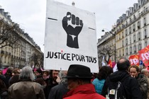 Protesters attend a demonstration against police brutality and racism in Paris in 2017.