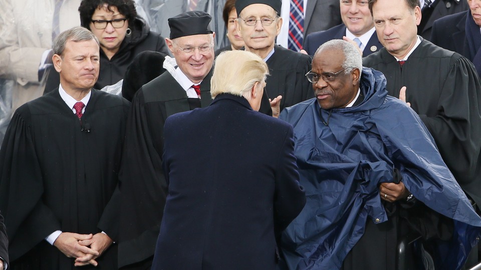 Donald Trump greets members of the Supreme Court at his inauguration.