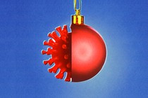 An illustration of a Christmas ornament and a virus particle