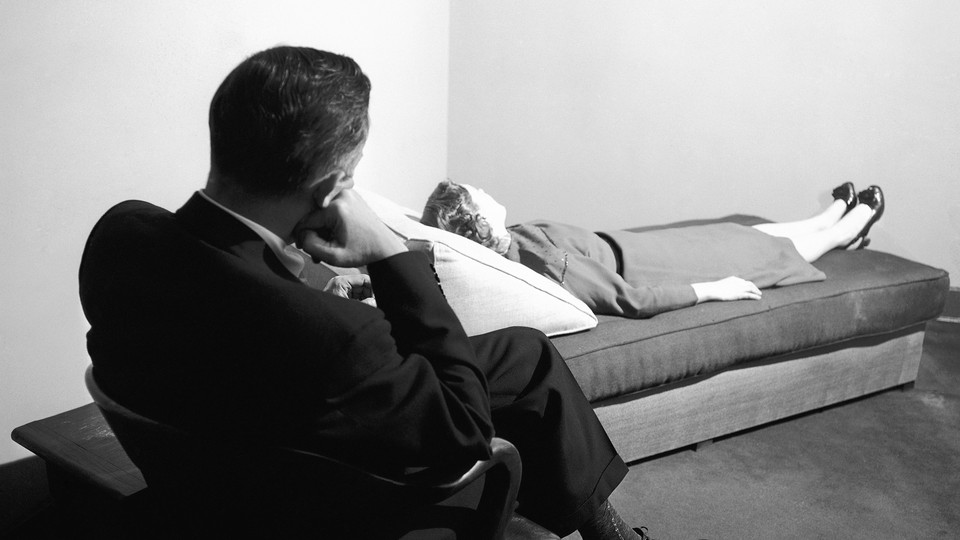 A doctor listens to a patient at the New York Psychoanalytic Institute Treatment Center in New York in 1956.