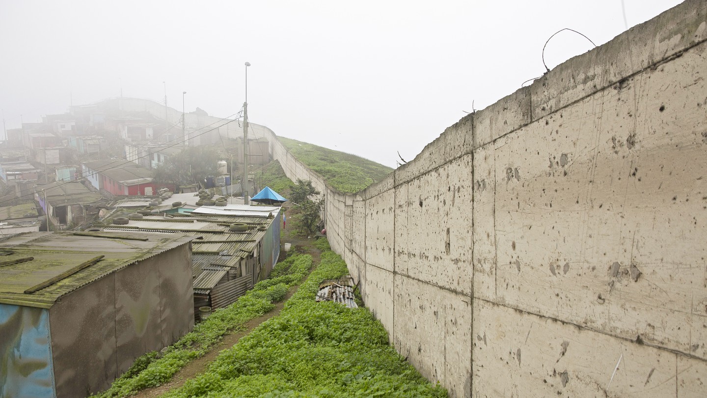 Lima, Peru's 'Wall of Shame' cuts through the poor zone of San Juan de Miraflores and the rich zone of Santiago de Surco.