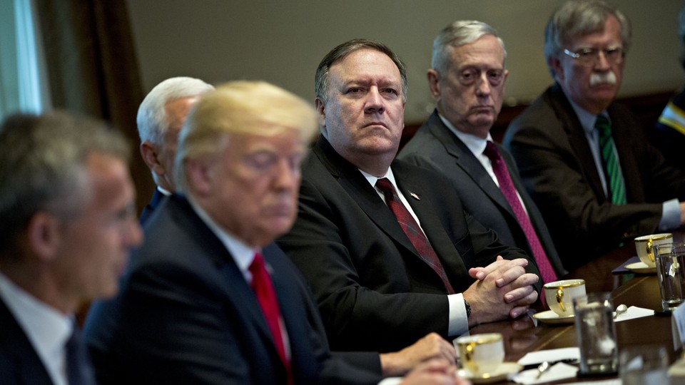 President Trump, Secretary Pompeo, Secretary James Mattis, and National-Security Adviser Bolton sitting at a table