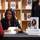 Michelle Obama signing books