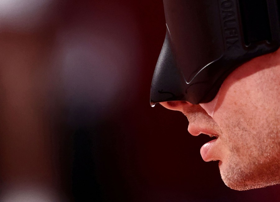 An athlete wears a mask during a goalball match.