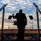 Photo of Trump's back as he speaks to a crowd
