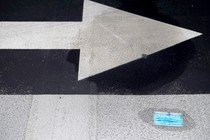 a mask lying in the street
