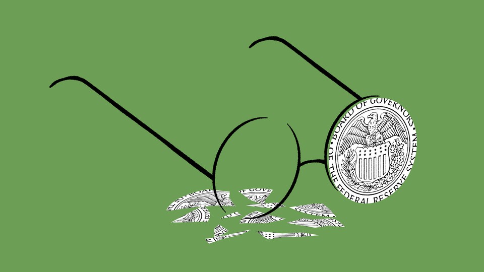 An illustration of a broken pair of spectacles bearing the Federal Reserve's symbol where the lenses would be