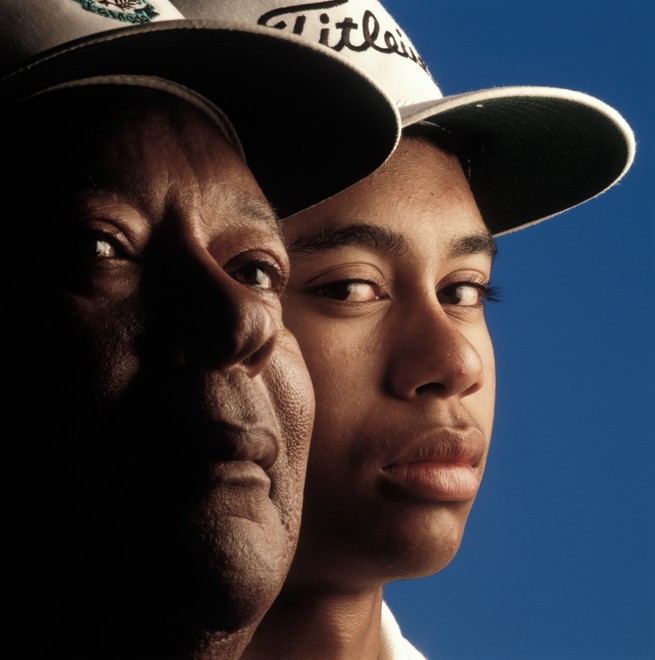 Portrait of golfer Tiger Woods with his father Earl Woods in 1992.
