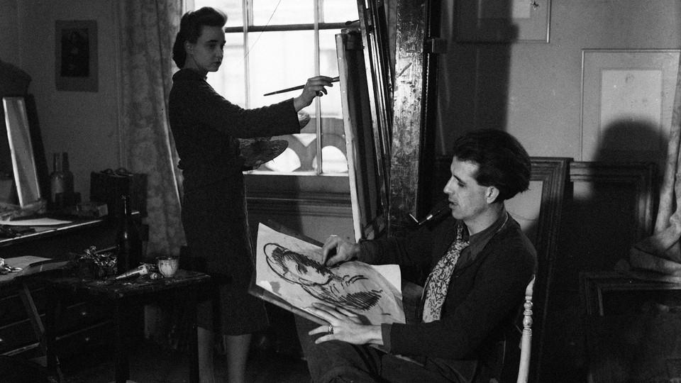 A man sketches a woman painting at her easel