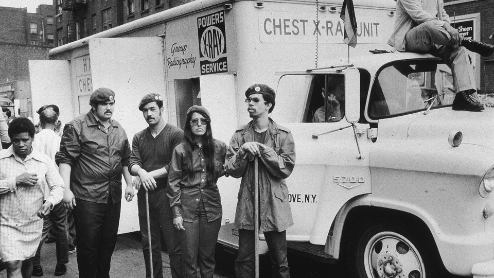 June 17, 1970: Members of Young Lords Party gather near the chest-X-ray unit they seized in East Harlem, New York City.