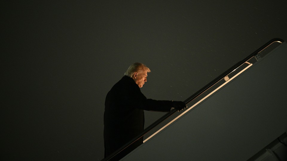 Donald Trump boards Air Force One before departing for his Mar-a-Lago residence, at Joint Base Andrews, in Maryland, on February 6, 2026.