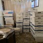 In a handout photo provided by the U.S. Department of Justice, stacks of boxes are seen in a bathroom and shower in the Mar-a-Lago Club’s Lake Room at former President Donald Trump’s estate in Palm Beach, Florida.
