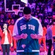 Enes Kanter Freedom of the Boston Celtics during the American national anthem prior to the first half of their NBA game against the Toronto Raptors at Scotiabank Arena, in Toronto, Canada, on November 28, 2021