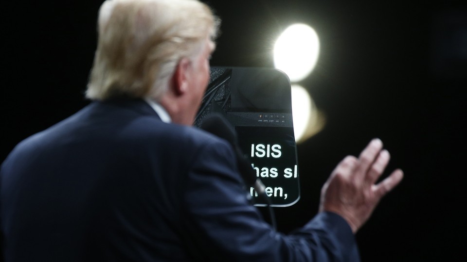 The word ISIS is pictured on a teleprompter as Republican presidential nominee Donald Trump speaks at a campaign event in Selma, North Carolina, U.S. November 3, 2016. 