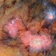 The Trifid nebula (top right) and the Lagoon nebula,