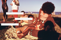 photograph of a family at the beach