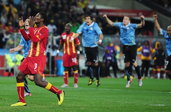 Asamoah Gyan of Ghana reacts as he misses a late penalty kick in extra time to win the match during the 2010 FIFA World Cup South Africa Quarter Final match between Uruguay and Ghana at the Soccer City stadium on July 2, 2010 in Johannesburg, South Africa.