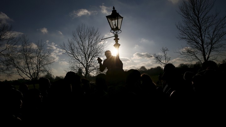 A speaker addresses a crowd