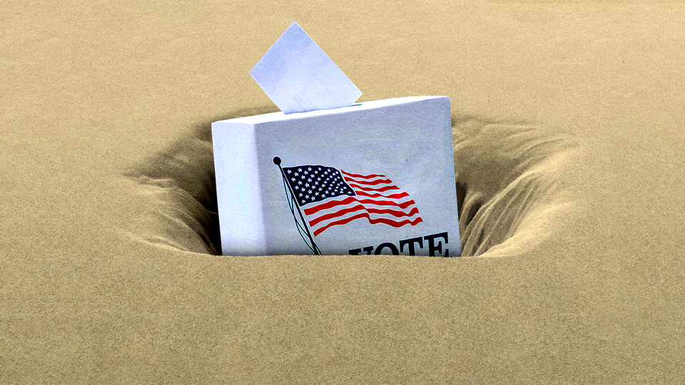 A ballot box being sucked into quicksand