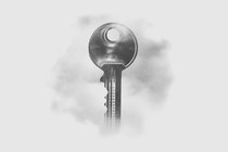 A grey key floats in the white and grey fog