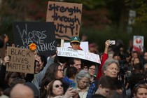 People march in memory of the victims of the Tree of Life synagogue shooting.