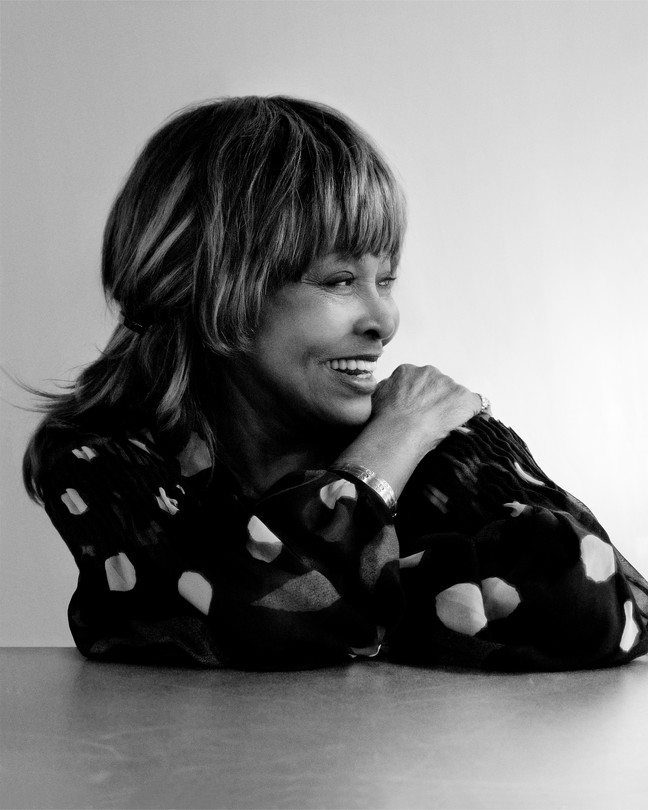 A black-and-white portrait of Tina Turner
