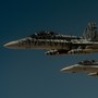 Two U.S. Marine Corps F-18 Super Hornets depart after receiving fuel from a 908th Expeditionary Air Refueling Squadron KC-10 Extender during a flight in support of Operation Inherent Resolve on May 31, 2017.