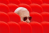 An image of Biden in a sea of red hats