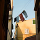 Photo of a narrow street in Corfu’s Old Town, with laundry hanging from above.