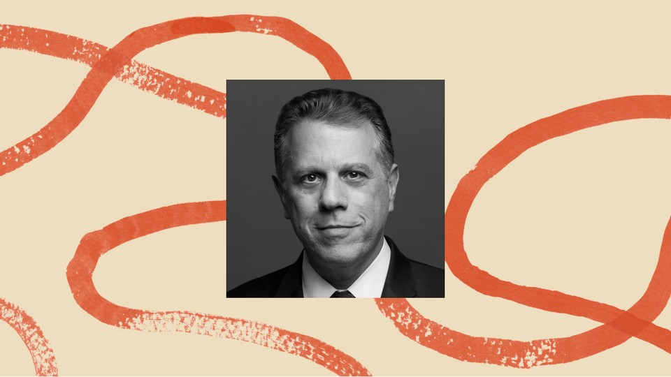 A photo of Michael Waldman, surrounded by an illustrated border