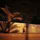 Man walks at night, in Aden, Yemen, February 10, 2018.