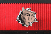 An illustration of Donald Trump's face showing from the ripped side of a shipping container