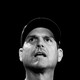 A black-and-white photo of Jim Harbaugh