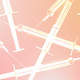 Syringes on a pink and orange gradient background