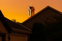 A church against an orange sky