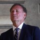 Photograph of Samuel Alito wearing a suit and tie from a low vantage point
