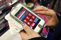 A person shops on a smartphone.