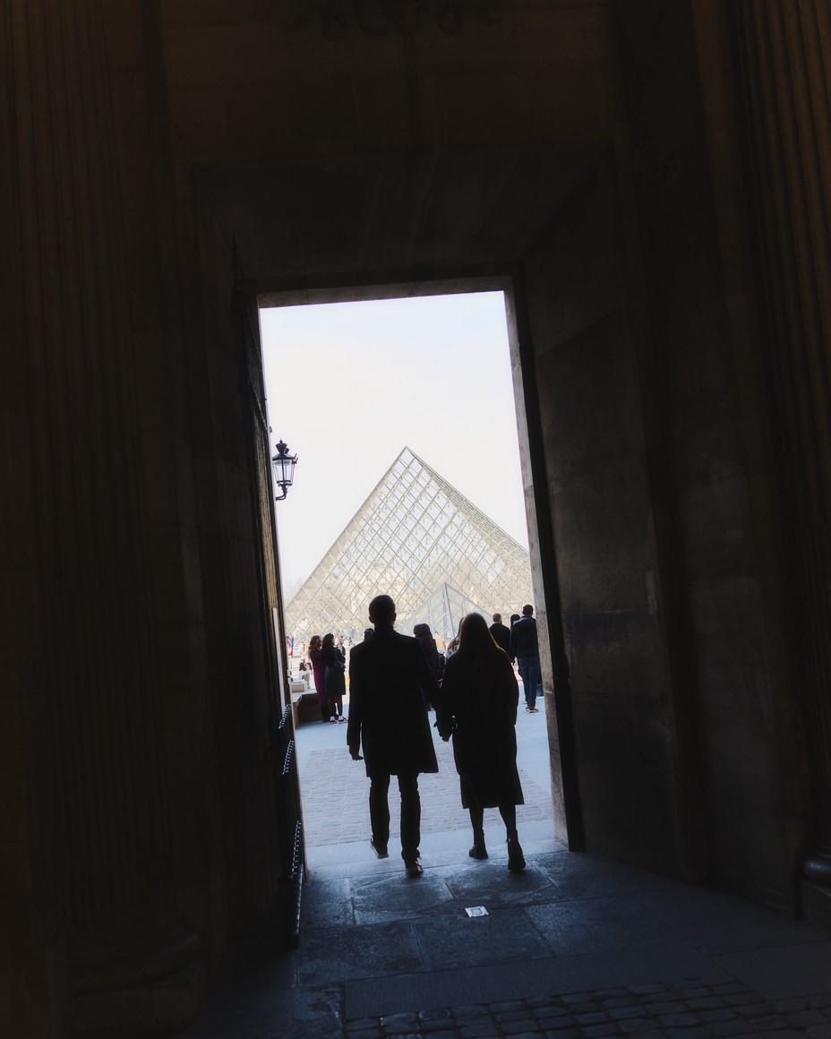 Picture of visitors outside the Louvre Pyramid