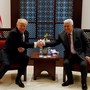 U.S. President Donald Trump shakes hands with Palestinian President Mahmoud Abbas during their meeting at the presidential headquarters in the West Bank town of Bethlehem on May 23, 2017. 