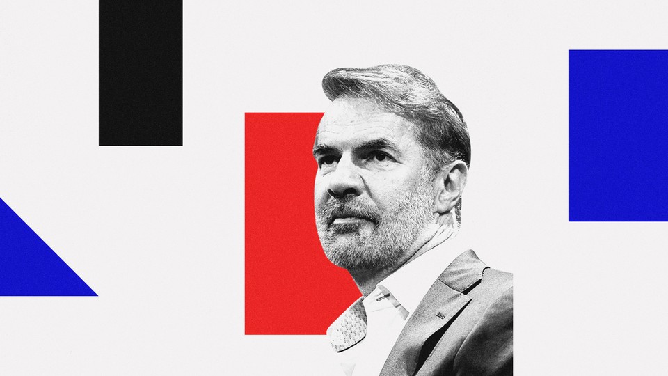 A black and white cropped bust photo of Erik Brynjolfsson, with a beard, in front of a white background with geometric shapes of various colors