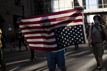 Protesters march through the street on May 28, 2020 in downtown Minneapolis, Minnesota.